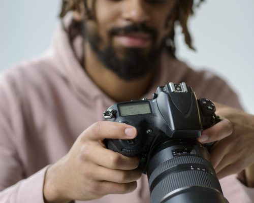 medium-shot-guy-with-photo-camera